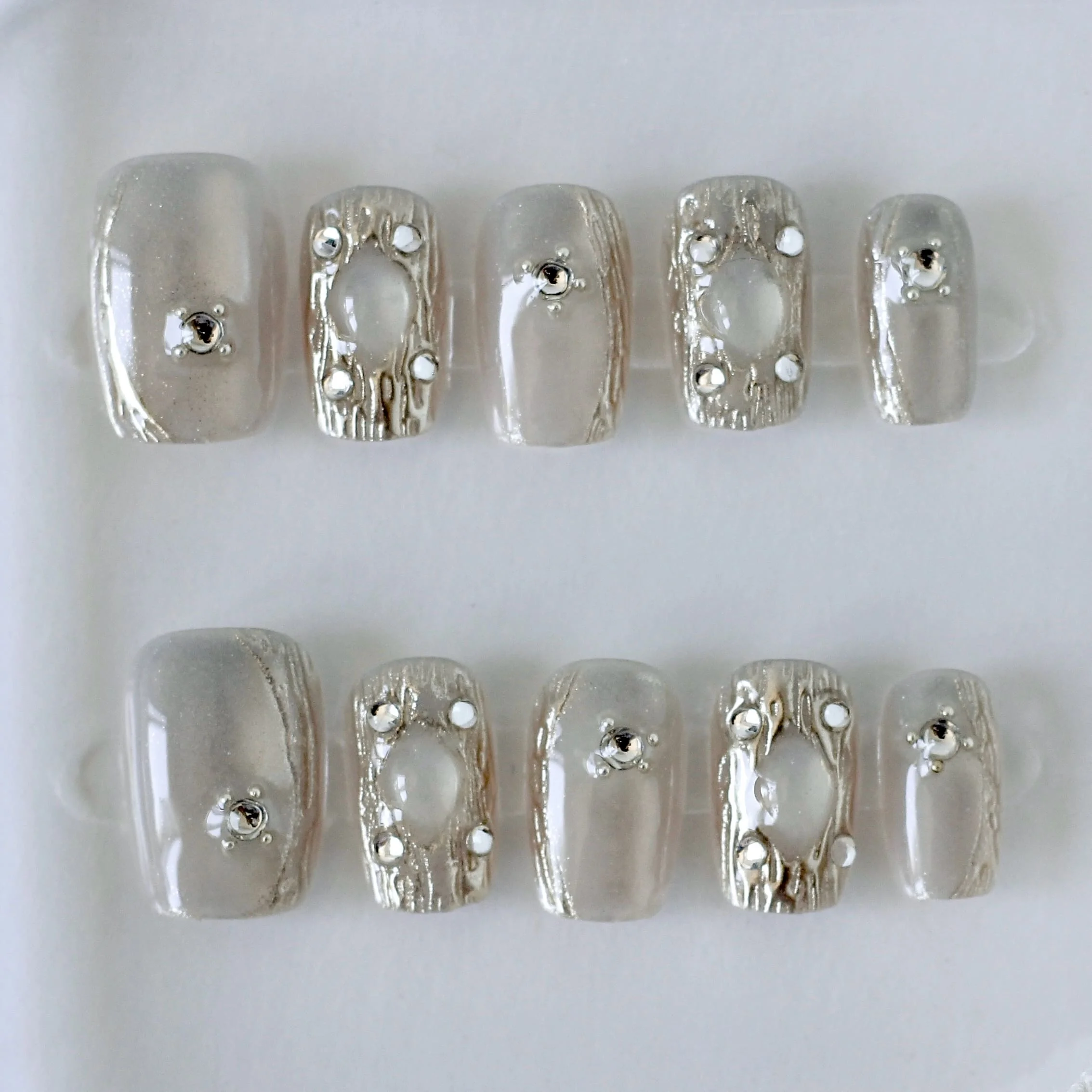 Cat eye blanco-1 Uñas postizas press on para verano